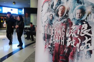 Kitajska spet odprla 500 kinodvoran, obiskovalci še plašni